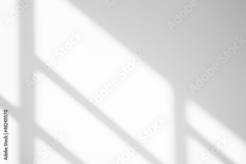Natural Light and shadow from window overlay effect on white background. Silhouette light abstract can use for wallpaper minimal,mock up design.Black and white blurred image backdrop.