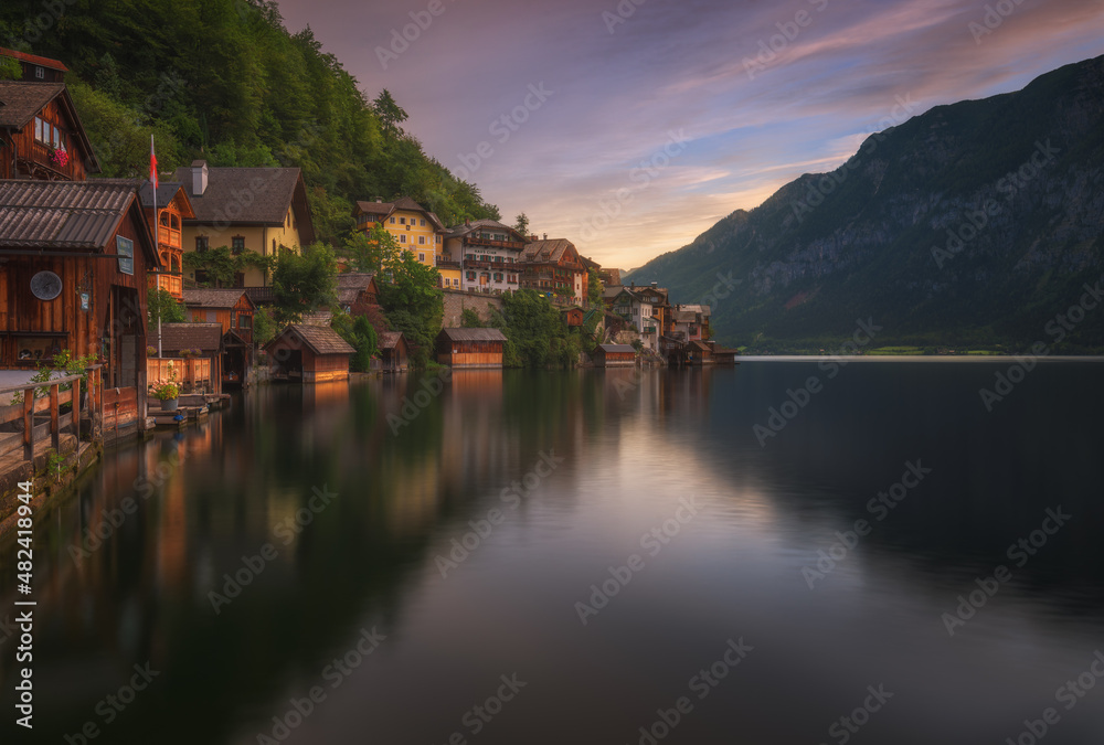 Hallstatt city near calm river Hallstatt city near calm river