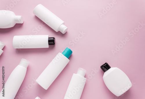 Cosmetics for body care, in plastic bottles, flat lay,top view