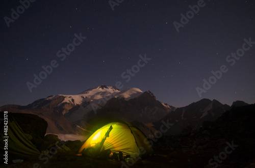 Tent in the mountains. View of Elbrus