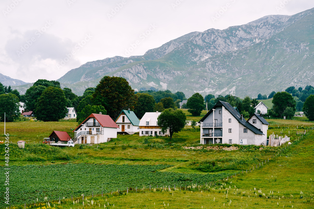 Cultivated fields near houses in a small village in northern Montenegro