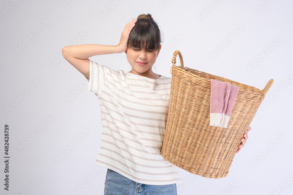 Young beautiful housewife smiling on white background Young beautiful housewife smiling on white background