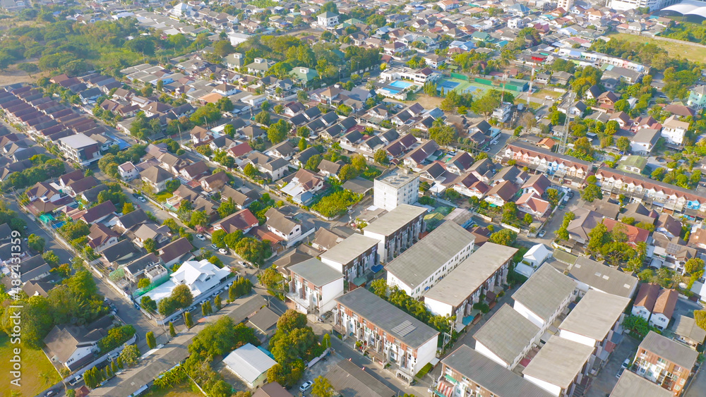 Aerial view of residential neighborhood. Urban housing development from above. Top view. Real estate in urban city town. Property real estate.