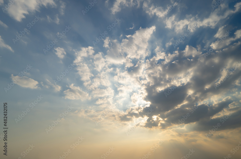 Sunset sky. Abstract nature background. Dramatic blue with orange colorful clouds in twilight time.