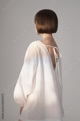 Dreamy brunette in white dress