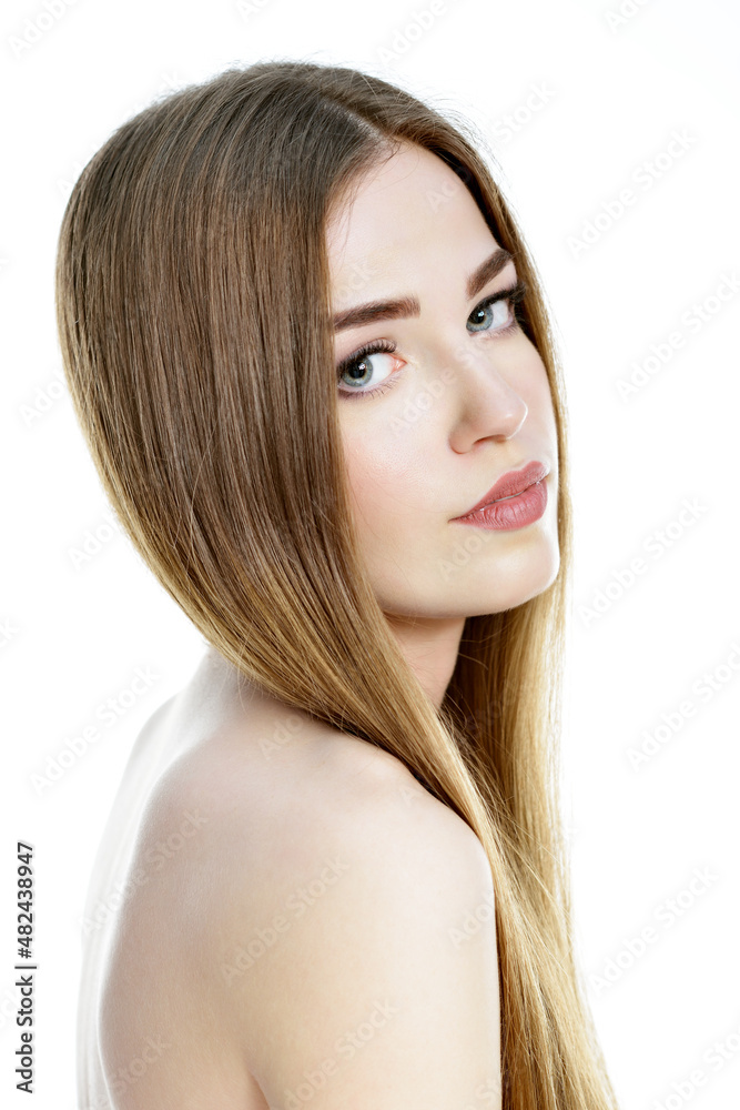 Beautiful young woman over white background. Beauty female portrait. Antiaging, skincare, beauty treatment and healthcare theme.