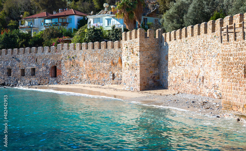 Tersane Beach and wall of fortress, Alanya, Turkey photo