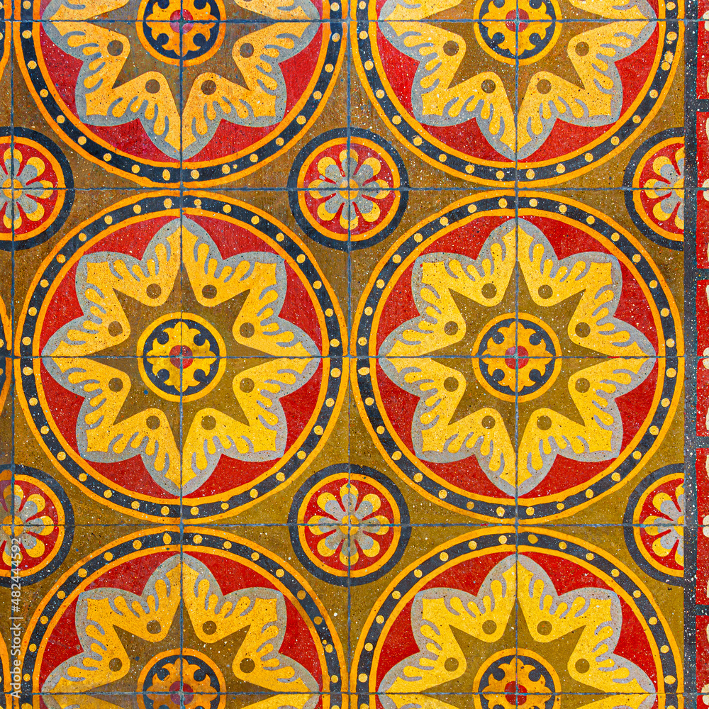 Photograph of traditional vietnam tiles in red, gray and yellow color