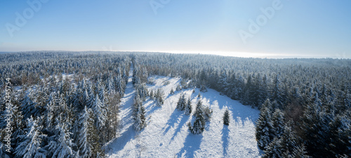 Stunning panorama background banner of snowy landscape in winter in Black Forest - Snow view winter wonderland.