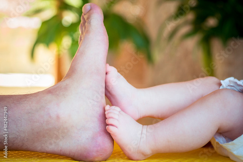 Daddy and baby's feets - Lovely family moment 