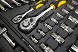 Close-up of  box with tools . Set of the professional tools. Closeup of chrome wrench tools organized in box. .Soft focus .