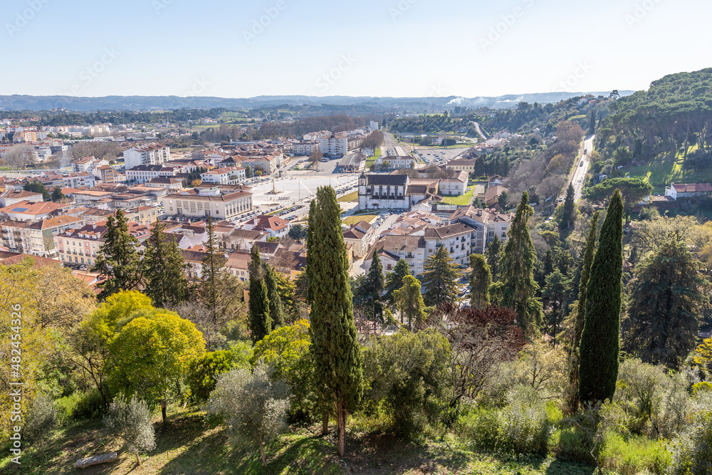 Fototapeta premium Convent of Christ or 'Convento de Cristo' is ornately sculpted, Manueline style, hilltop Roman Catholic convent in Tomar, Portugal. Templar stronghold complex is a historic and cultural monument.