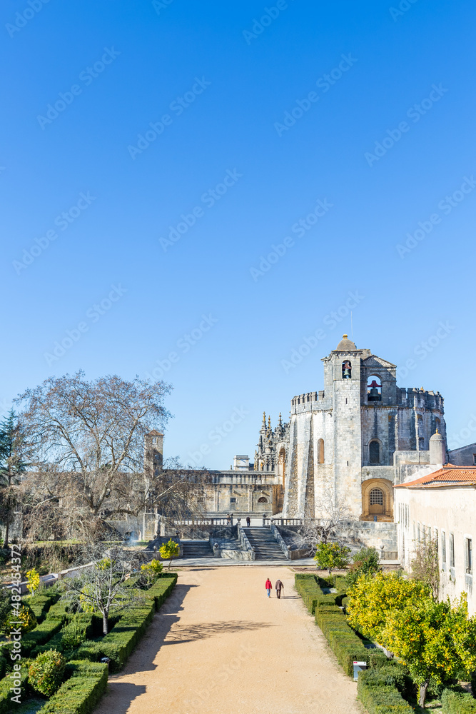 Fototapeta premium Convent of Christ or 'Convento de Cristo' is ornately sculpted, Manueline style, hilltop Roman Catholic convent in Tomar, Portugal. Templar stronghold complex is a historic and cultural monument.