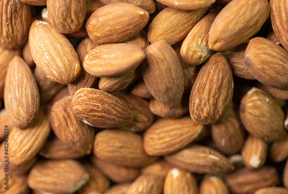 Dry Almond Nuts. Vegetarian food rich in minerals and vitamins. Selective focus Dry Almond Nuts. Vegetarian food rich in minerals and vitamins. Selective focus