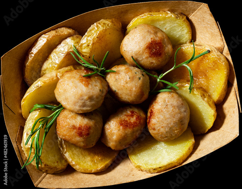 milanese mondeghili meat balls in a paper bag. italian street food photo