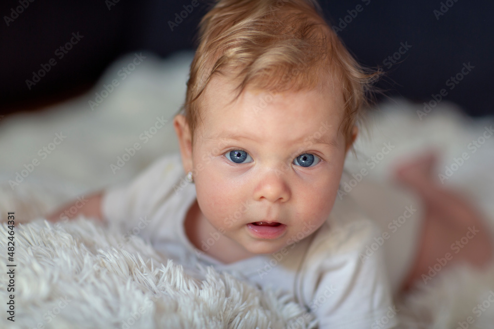 Adorable baby with beautiful blue eyes.crawling baby.child smiling. Adorable baby with beautiful blue eyes.crawling baby.child smiling.