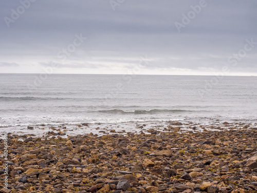 Very stoney beach at Lindisfarne, Holy Island, Northumberland, UK