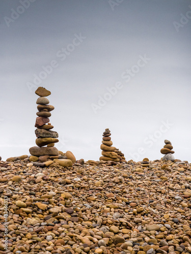 Stone stack sculpturers on Lindisfarne Beach  Holy Island  Northumberland  Uk