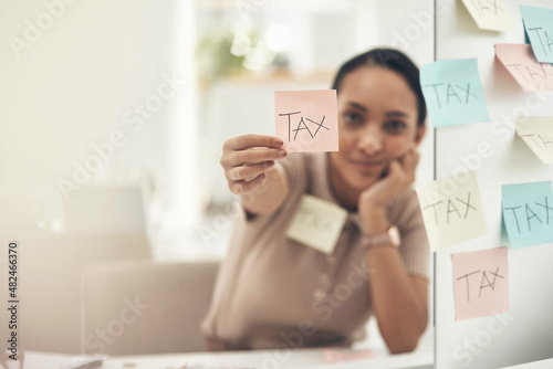 Be aware of different filing deadlines. Shot of a young businesswoman holding a note with 