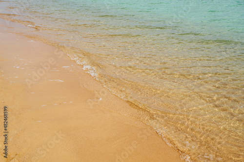 Waves on the tropical sandy beach of the red sea.