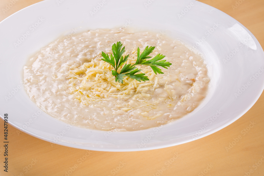 Cheese Risotto Italian Cuisine.. Made with rice arboreo and Grana Padano cheese Cheese Risotto Italian Cuisine.. Made with rice arboreo and Grana Padano cheese