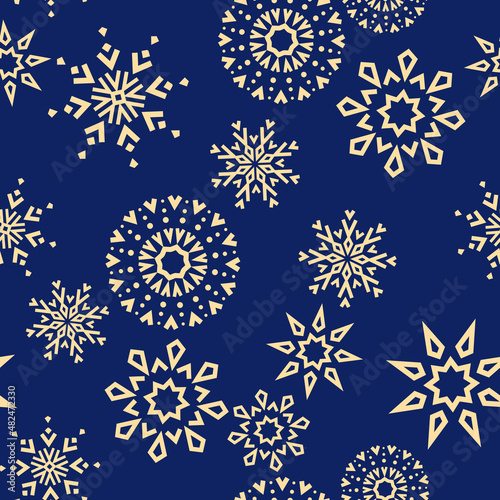 Abstract geometric pattern with lines  snowflakes. A seamless vector background. Gold and dark blue texture. Graphic modern pattern