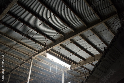 exposed roof ceiling in an abandoned shopping mall