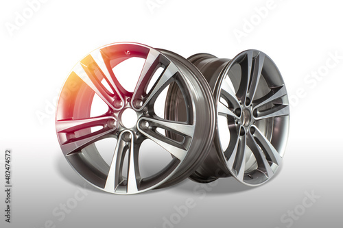 Obraz na płótnie Two aloy wheel rims isolated on white background.