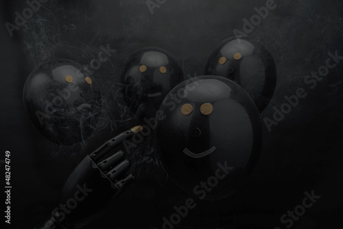 black balls face black background