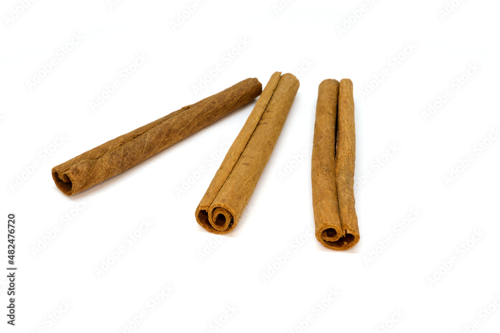cinnamon sticks isolated on white background cinnamon sticks isolated on white background