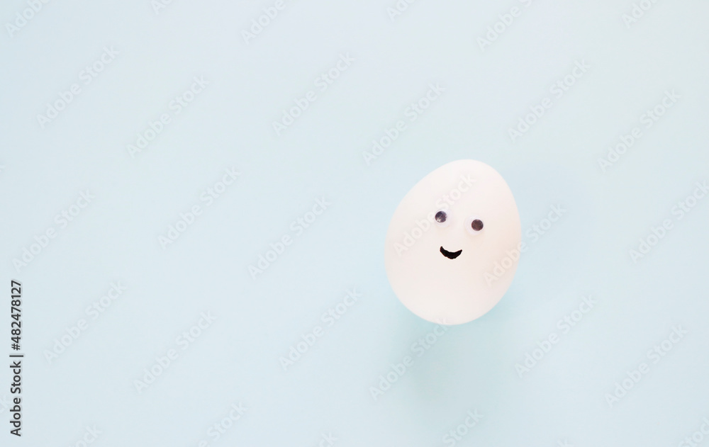 Easter eggs creative flat lay on blue background. Minimal concept. Easter eggs creative flat lay on blue background. Minimal concept.