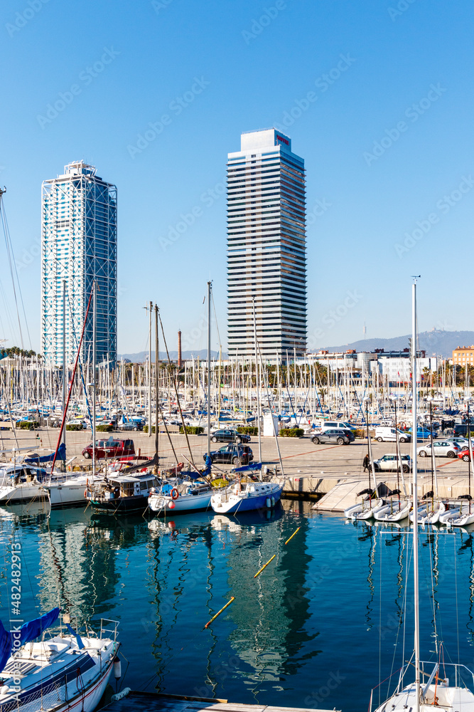 View at the towers in Port Olympic, the Olympic harbor in Barcelona, Catalonia, Spain