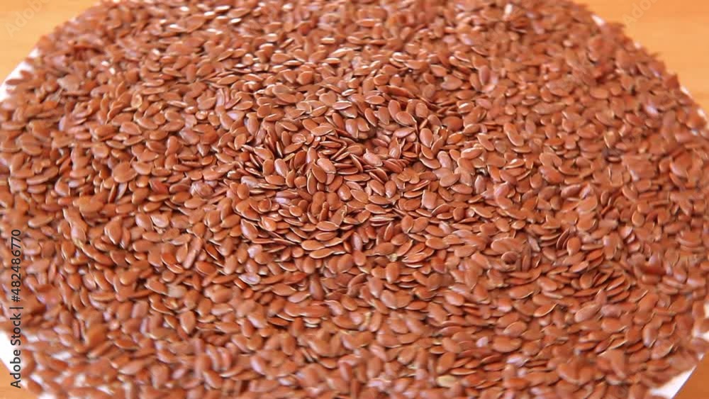 Brown flax seeds, healthy food ingredients Brown flax seeds, healthy food ingredients