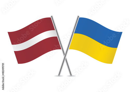 Latvia and Ukraine flags. Latvian and Ukrainian flags, isolated on white background. Vector illustration.