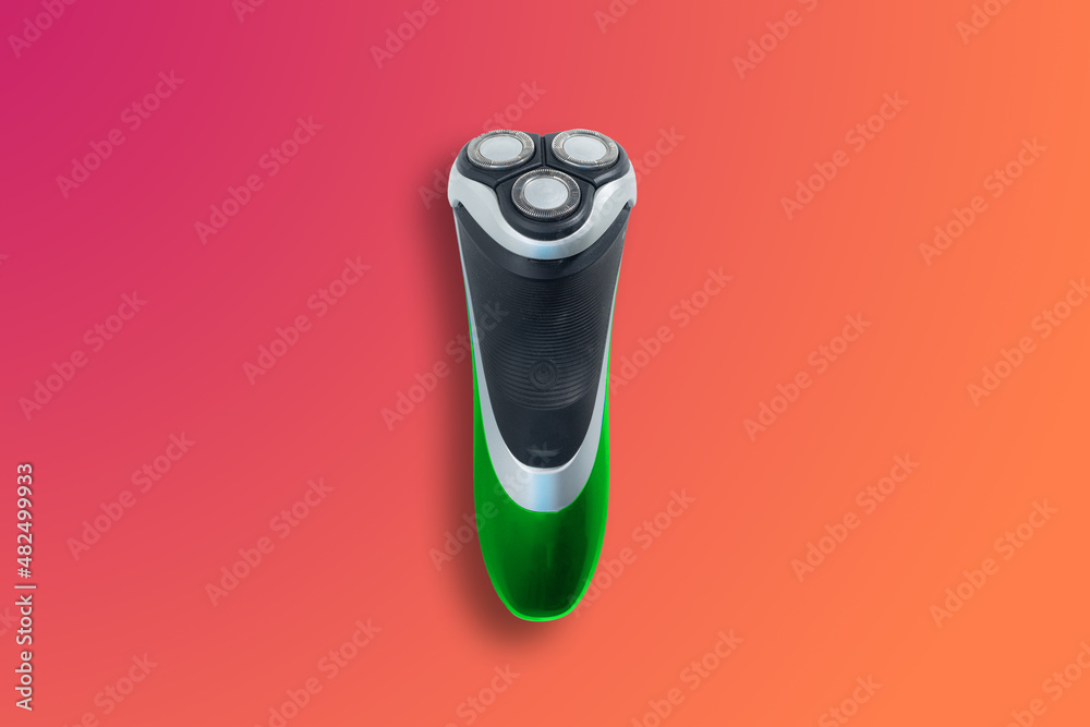 Electric shaver. Facial shaving concept, men's daily personal care. Taking care of your appearance. Shaving trimmer. Electric shaver. Facial shaving concept, men's daily personal care. Taking care of your appearance. Shaving trimmer.