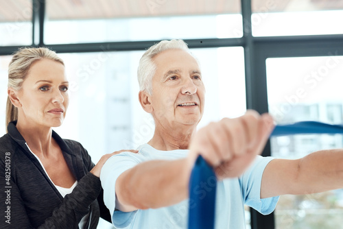 Be serious about your health. Shot of a a physiotherapist working with a senior patient using a resistance band. © Camerene P/peopleimages.com