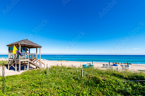 Lifeguard station with beach and ocean in Deerfield Beach  Florida. Clear Blue sky with empty space