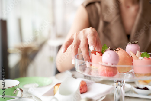 Photography asian woman having dessert in restaurant