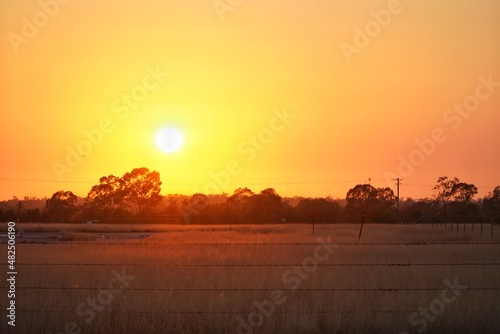 Sunrise over the gas fields, Chinchilla, Queensland, Australia photo