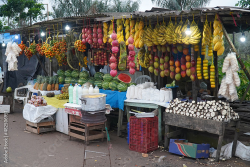 Tropical fruits and products for sale placed on a roadside sales point. Typical Amazon fruits in the village of Cacau Pirera, Brazil. photo