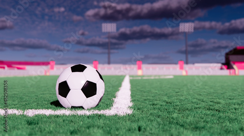 Soccer ball on grass field stadium © safri