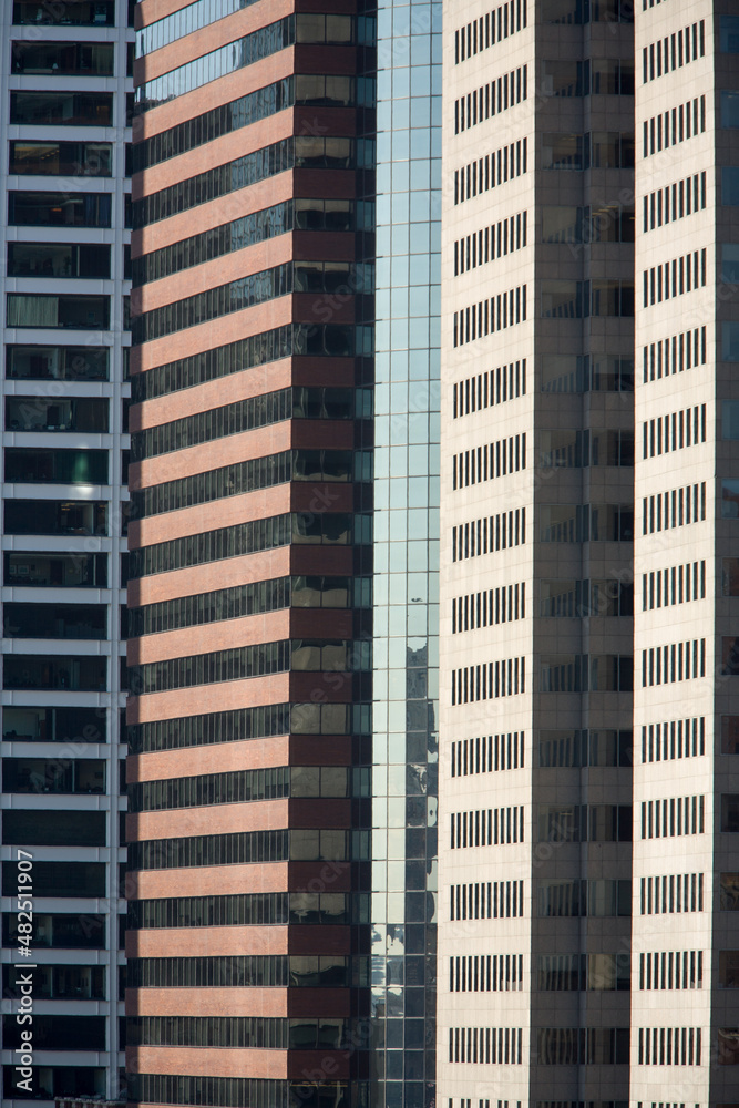New York City skyscrapers side by side, vertically with windows New York City skyscrapers side by side, vertically with windows