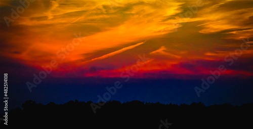 A sunset over a field in Rome, Ohio © Rebel Studios
