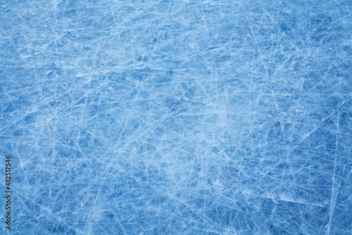 The surface of the ice is indented by skates.