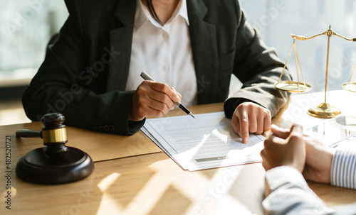 Good service cooperation, Consultation of Businesswoman and Male lawyer or judge counselor having team meeting with client, Law and Legal services concept.