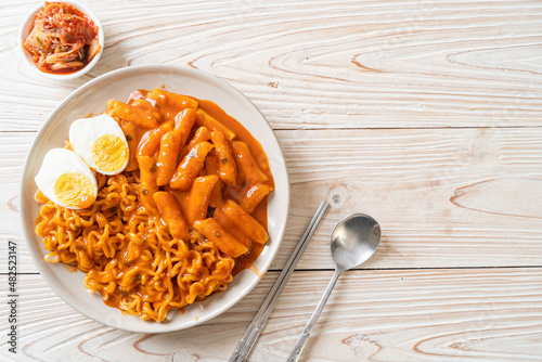Rabokki (Ramen or Korean instant noodle and Tteokbokki) in spicy korean sauce photo