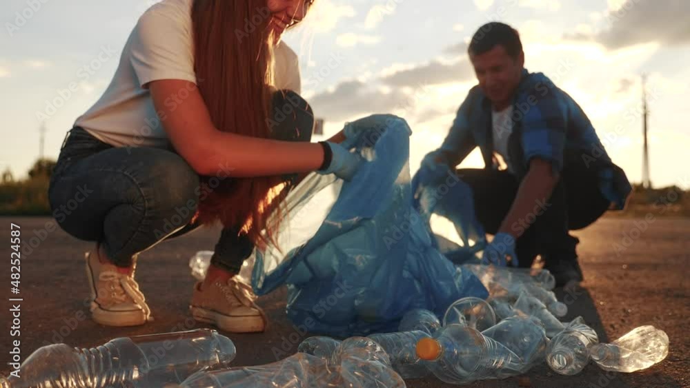 teamwork trash volunteer concept. people group clean on collects garbage plastic trash paper waste bottles trash. environmental team clean a ecology teamwork volunteer awareness pollution teamwork trash volunteer concept. people group clean on collects garbage plastic trash paper waste bottles trash. environmental team clean a ecology teamwork volunteer awareness pollution