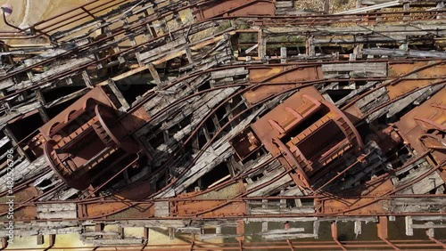 Top-down close-up view of the rusty mining equipment left at the abandoned Mitsero mines. photo