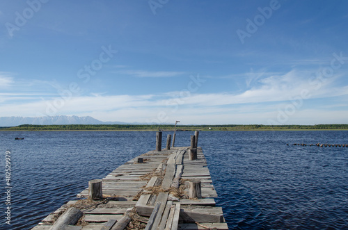 Old wooden pier on the Barguzin River, Buryatia, Russia.