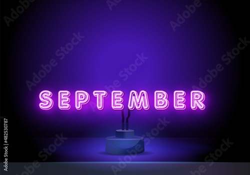 September Neon glowing lettering on a dark wall background. Hello september neon sign. neon symbol